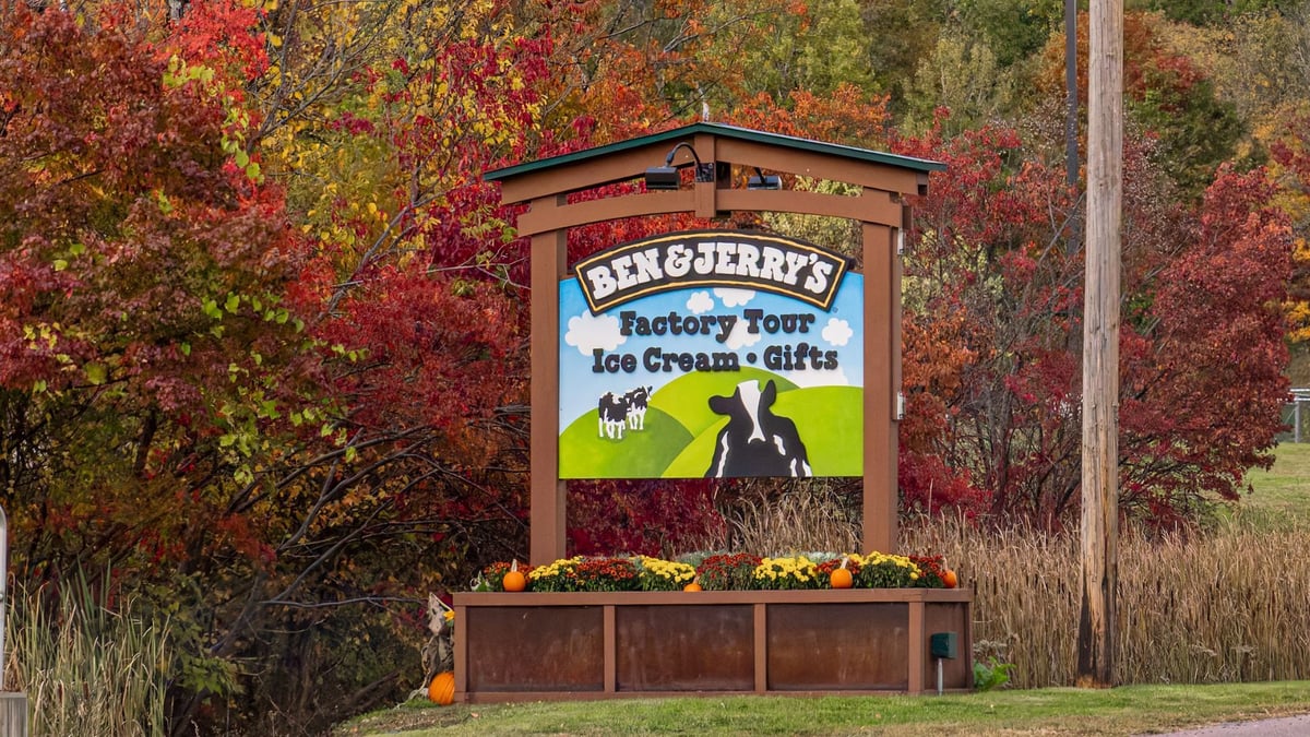 Sign outside Ben & Jerry's factory in Vermont showing factory tours, ice cream and gifts 