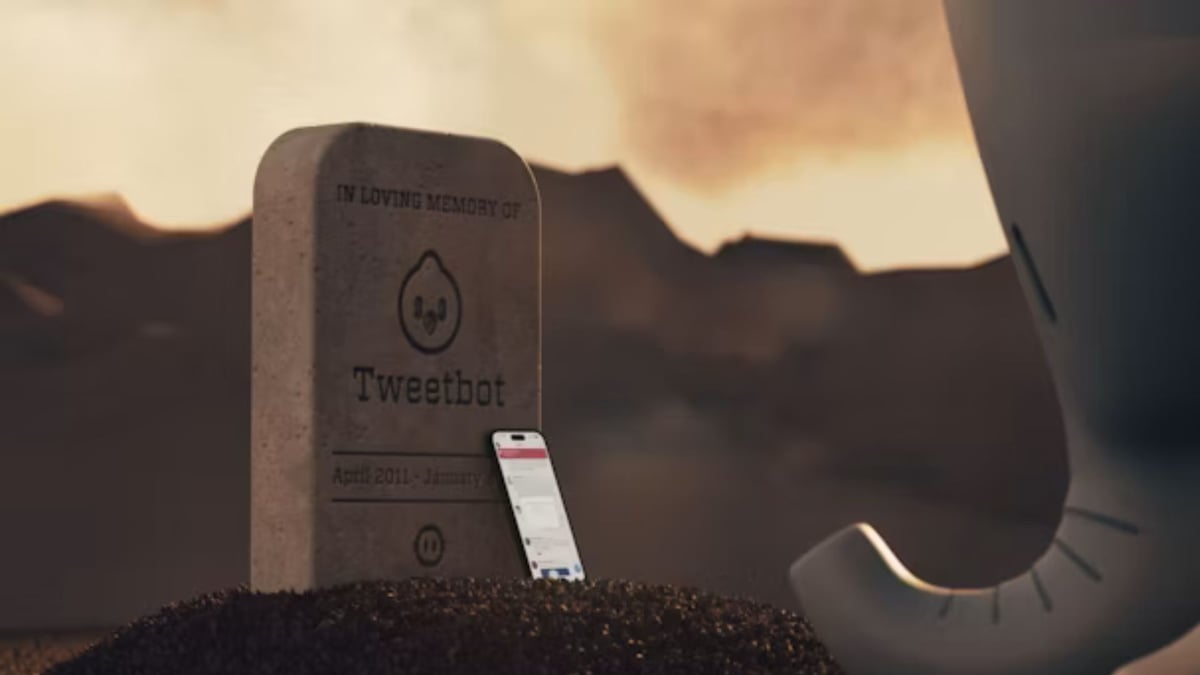 Graveside headstone reading 'In loving memory of Tweetbot'